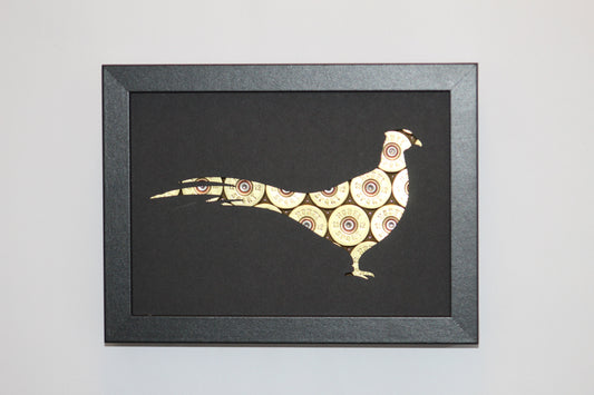 Fasan mit Kaliber 12 Hülsen