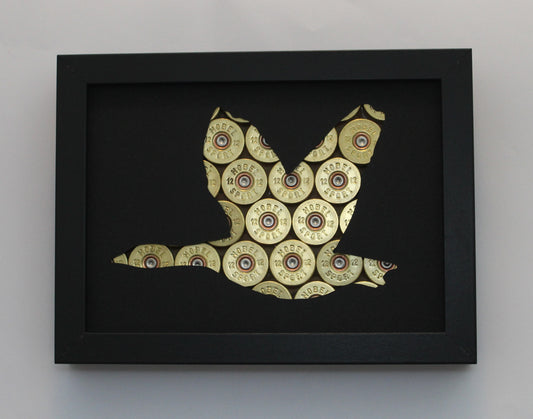 Gans mit Kaliber 12 Hülsen